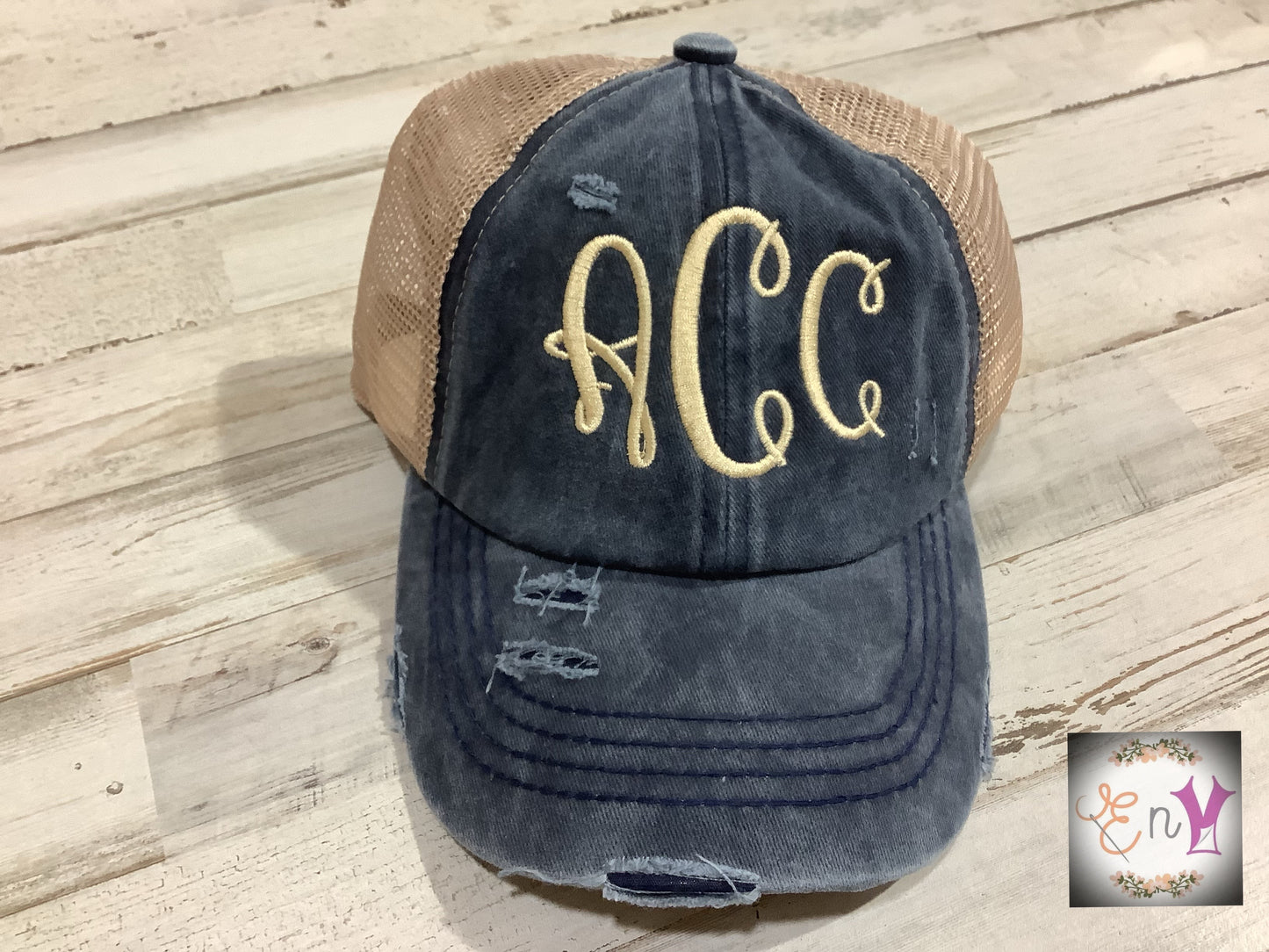 C.C. Distressed Ponytail Trucker Hat