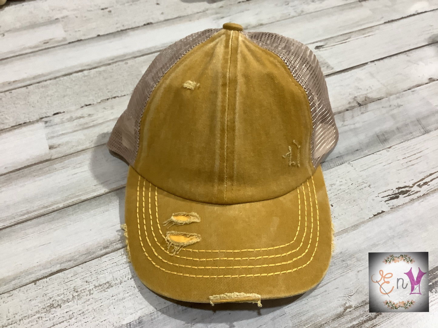 C.C. Distressed Ponytail Trucker Hat