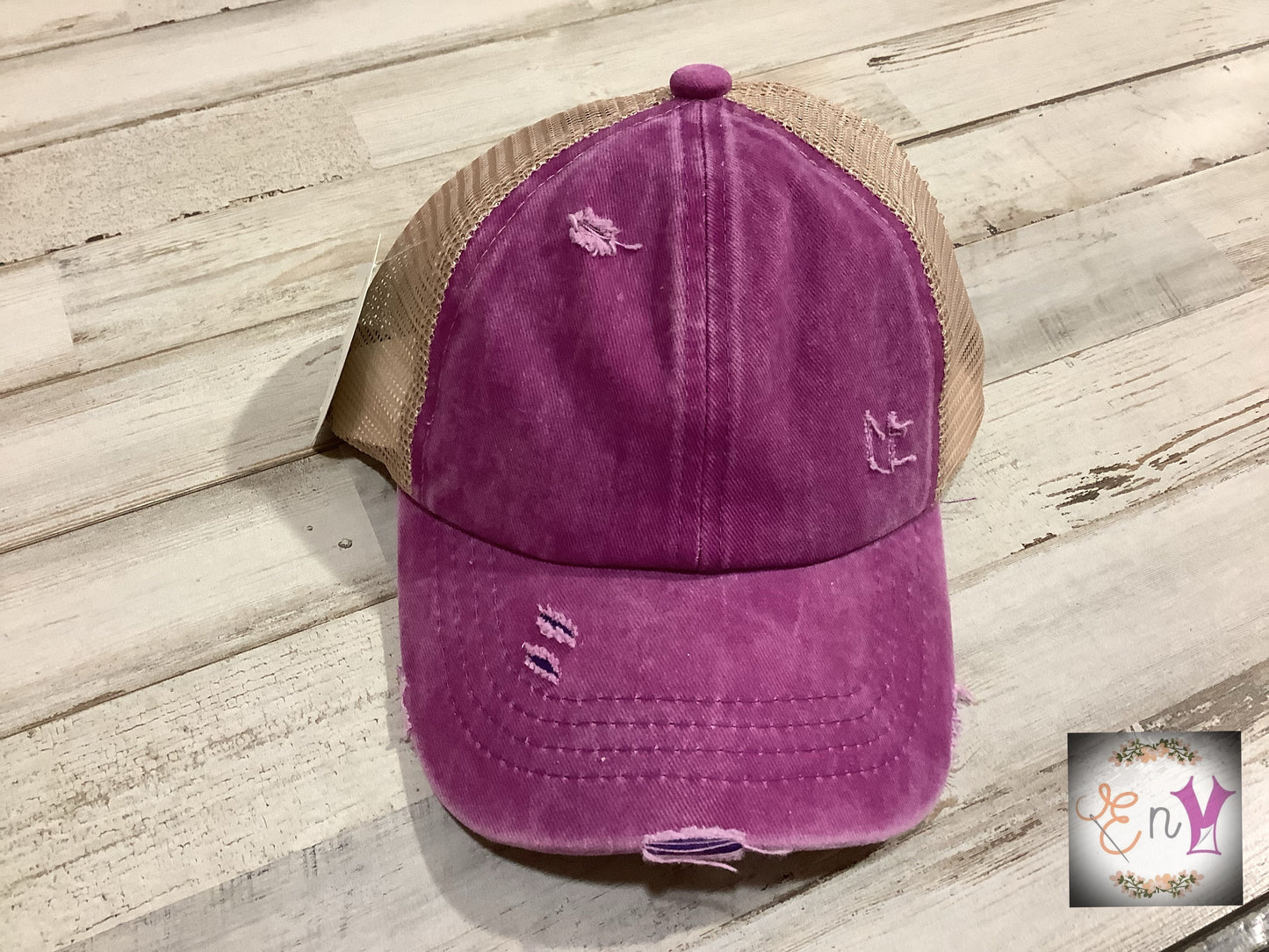 C.C. Distressed Ponytail Trucker Hat