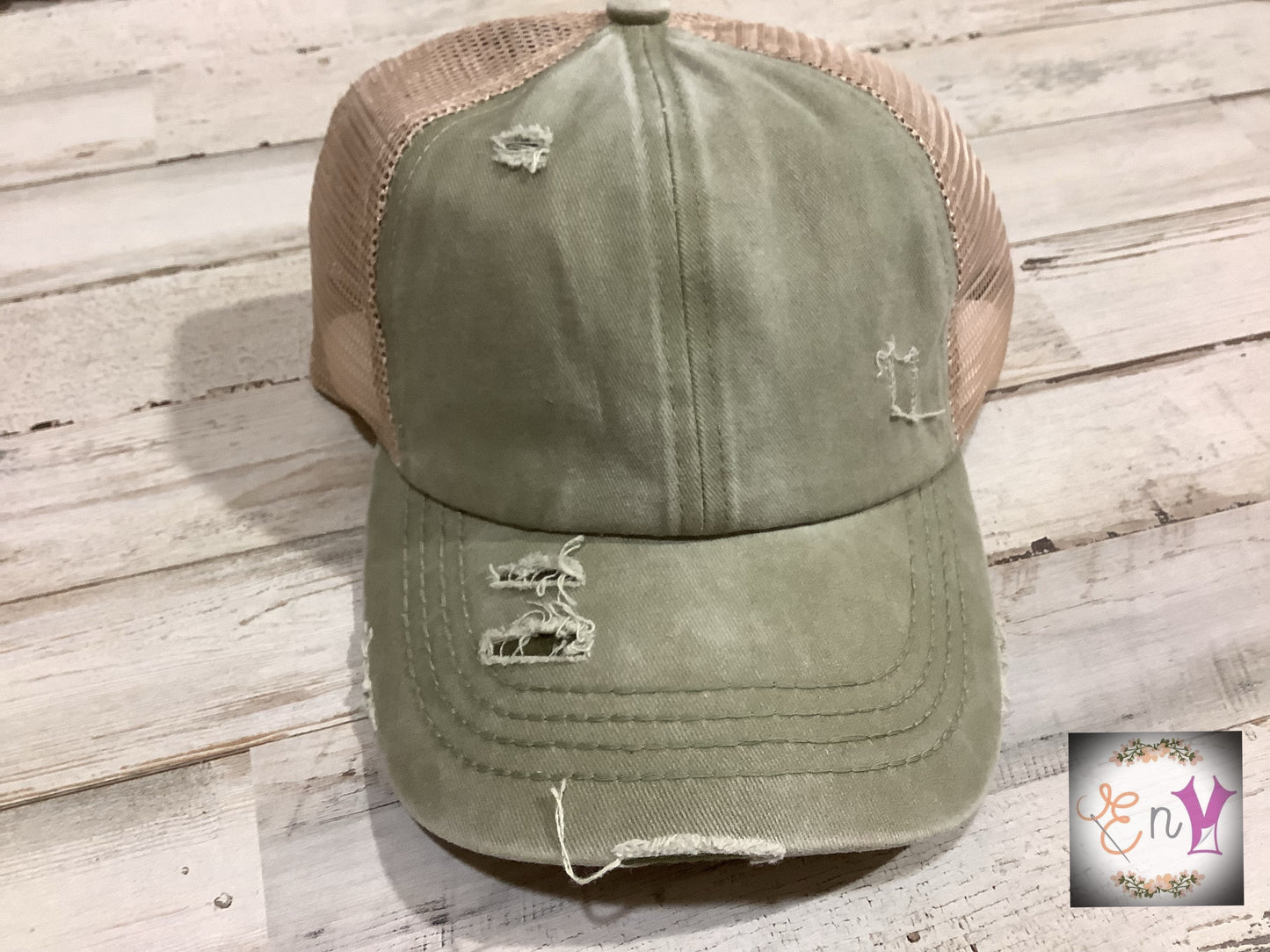 C.C. Distressed Ponytail Trucker Hat