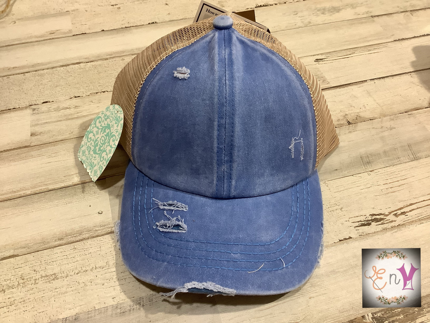 C.C. Distressed Ponytail Trucker Hat